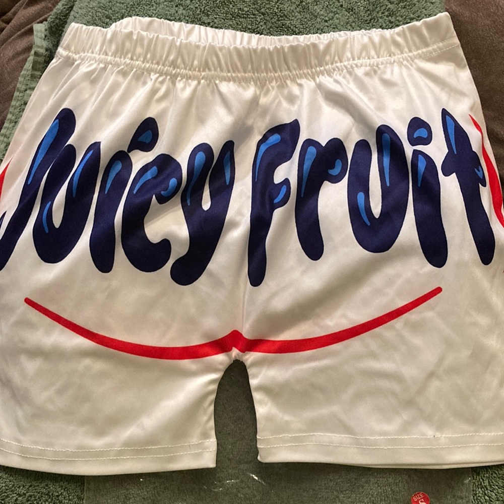Snack shorts brand new in the package size small Color is white
